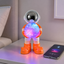 Oranje astronaut Bluetooth speaker en kleurrijke nachtlamp naast een smartphone