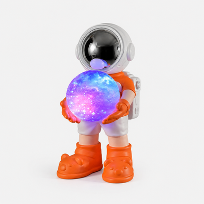 Oranje astronaut Bluetooth speaker met verlichte galaxy bol